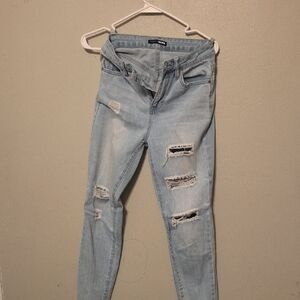 Fashion Nova Light Blue Ripped Skinny Jeans